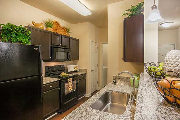 The Haven at West Melbourne offers quality apartment homes with spacious living rooms and modern kitchens.