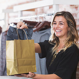 Resident shopping at one of the many retail shops near 4000 Hulen Urban Apartment Homes