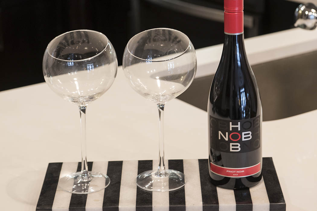 Bottle of wine and two glasses at Anthem Cityline in Richardson