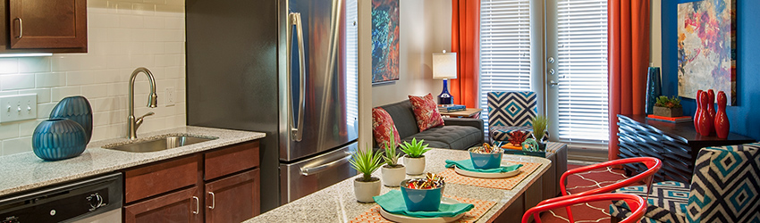Kitchen with Granite Countertops at Sunrise By The Park