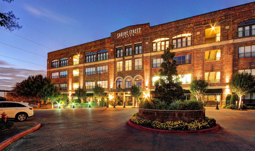 Illuminated building at apartments in Houston, TX