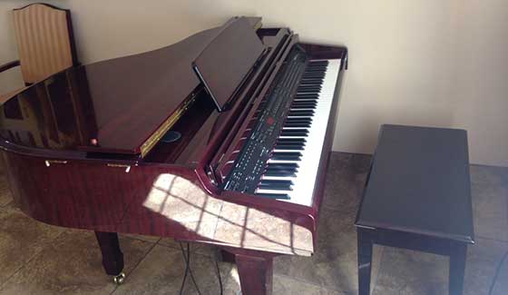 An elegant piano for resident use at Pennington Gardens