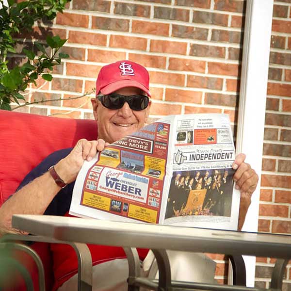 Resident reading at Garden Place Waterloo