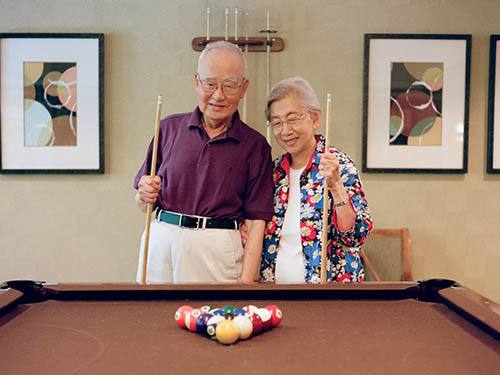 Seniors living a happy life here at Merrill Gardens at Siena Hills