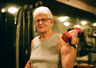 Woman lifting at senior living in San Diego