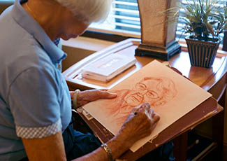 Happy resident at senior living in Woodstock