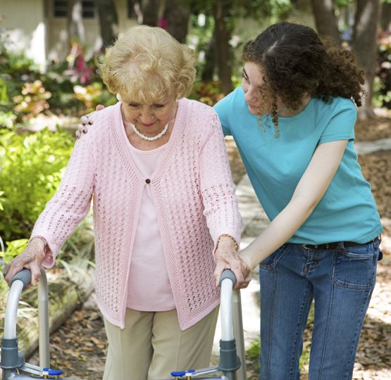 resident being helped by caretaker at The Terrace at Mountain Creek in Chattanooga,TN