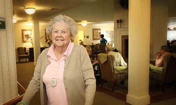 Woman in communal area at Carriage Court of Hilliard in Hilliard