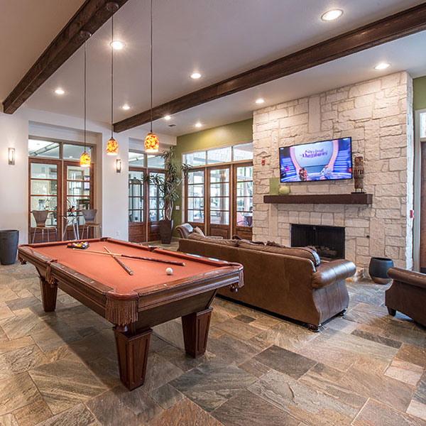 Pool table at Avana Brazos Ranch Apartments