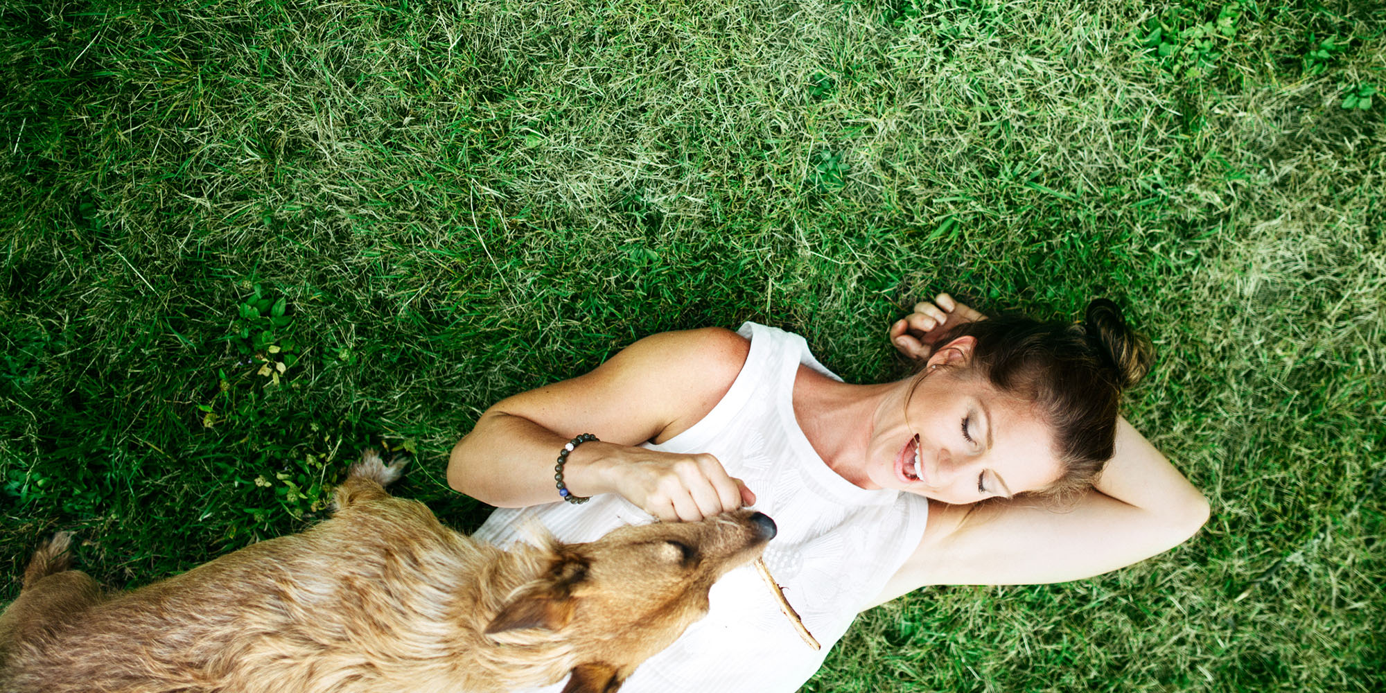 Women with dog at Avana on Seven Apartments