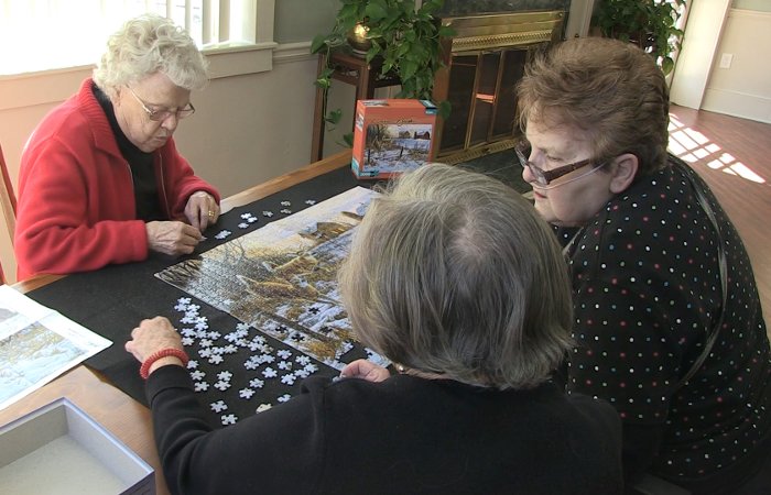 Enjoying puzzle game at The Florence Presbyterian Community