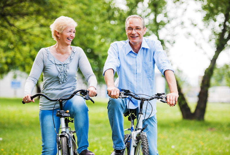 Couple riding their bikes in Summerville