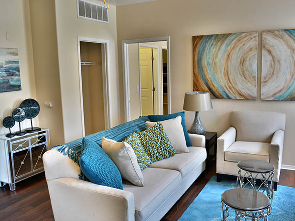 Living Room at Promenade at Hunter's Glen Apartments in Thornton