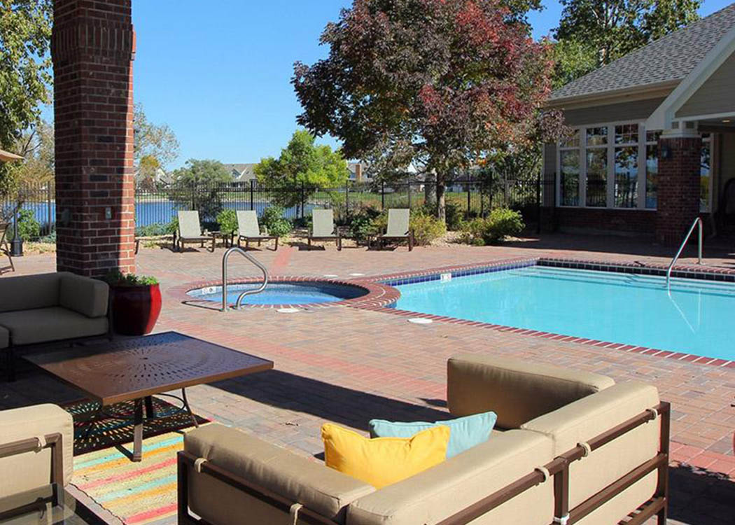Pool at Promenade at Hunter's Glen Apartments in Thornton