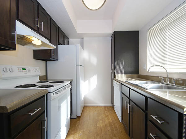 Kitchen at Springs of Country Woods Apartments in Midvale
