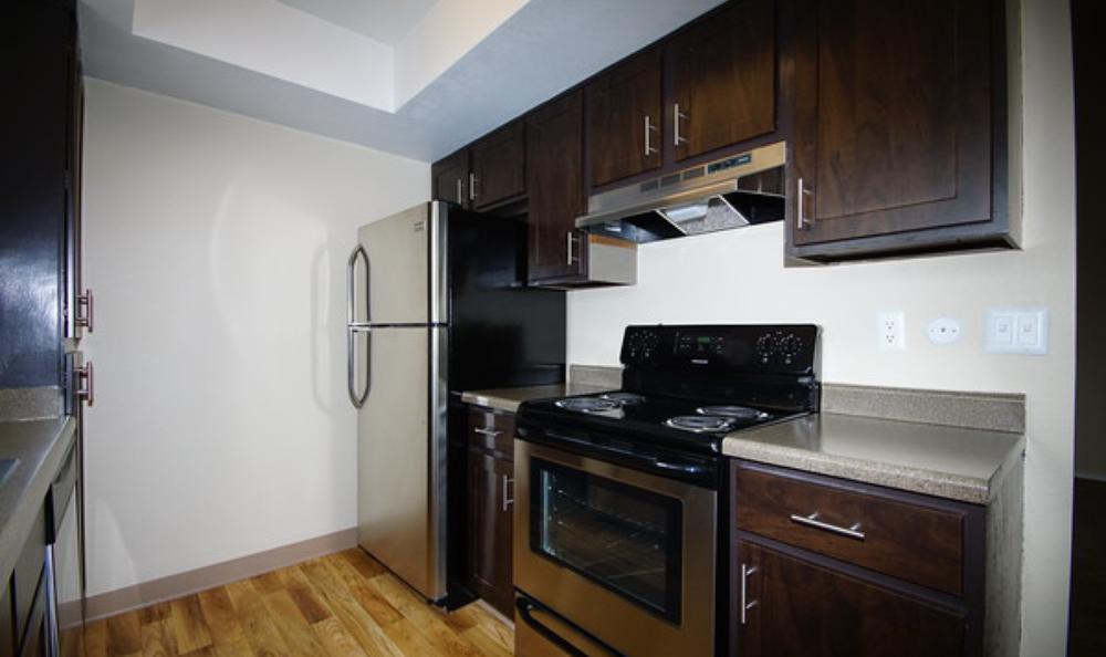 Kitchen at Springs of Country Woods Apartments in Midvale