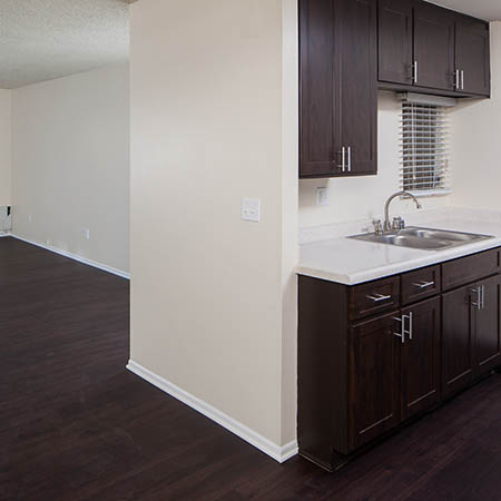 Kitchen and Living Room at Kendallwood Apartments in Whittier,CA