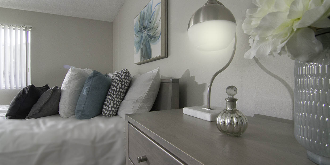 Night stand in bedroom at Brighton Place