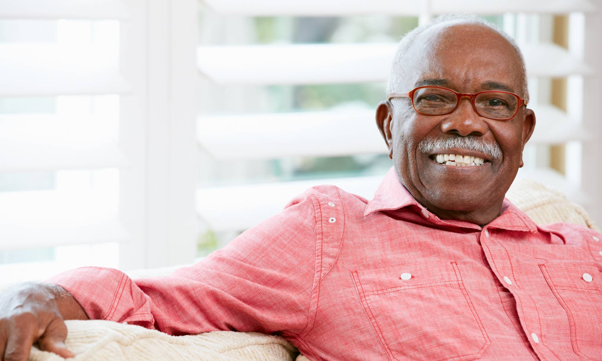 Ecstatic Pacifica Senior Living Woodmont resident enjoying every day