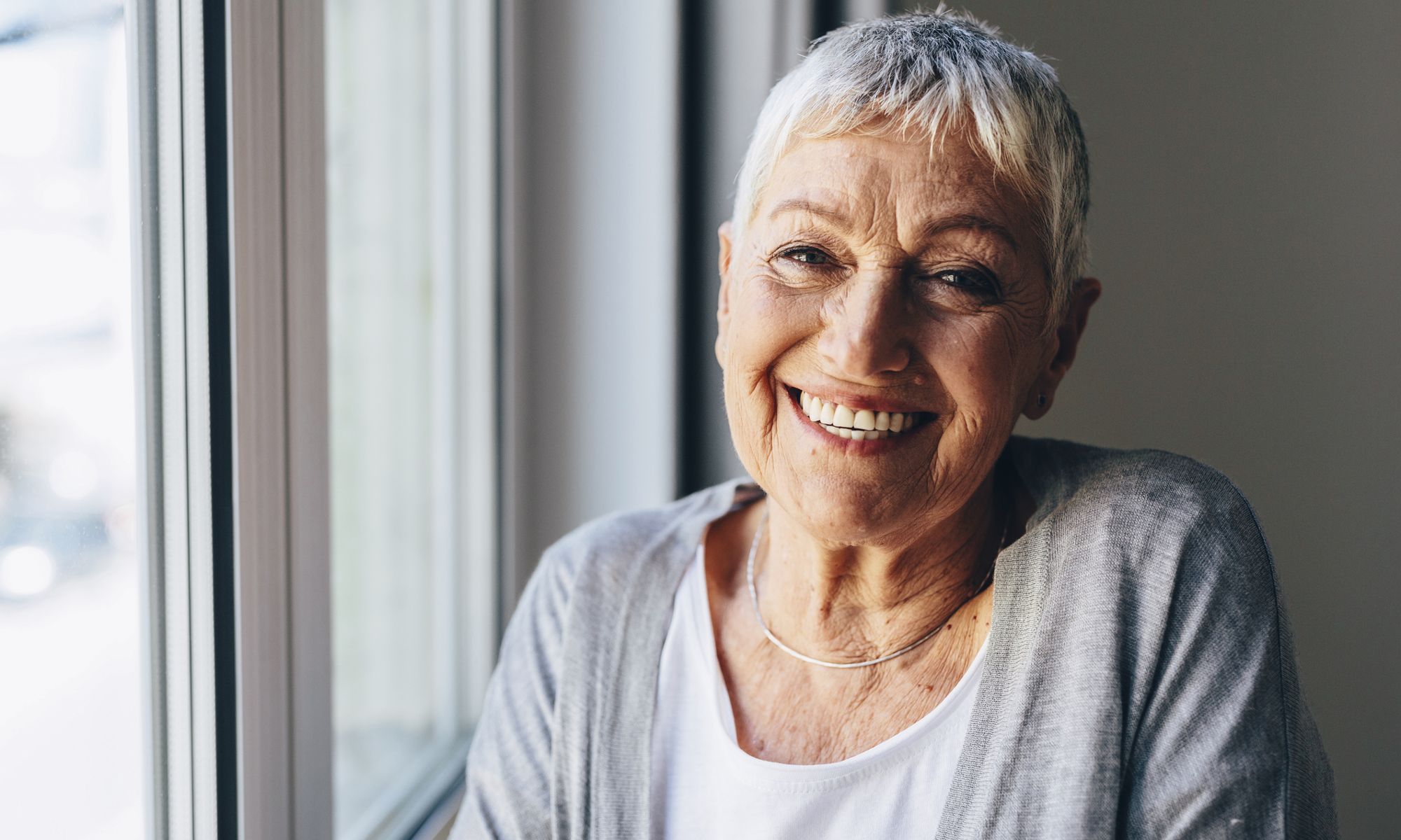 Happy resident at Pacifica Senior Living Woodmont