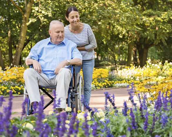 Staff member at our senior living facility in Vancouver on a walk with a resident