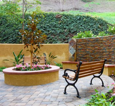 Enjoy the services and amenities offered at Pacifica Senior Living Heritage Hills in North Carolina, such as this lovely outdoor sitting area