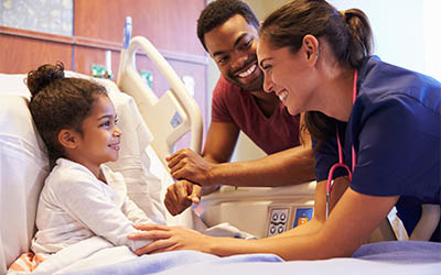 Nurse with patient near Olmsted Place in Boston