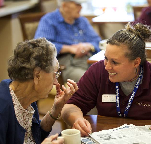 Professional staff attending our residents at Glen Carr House Memory Care
