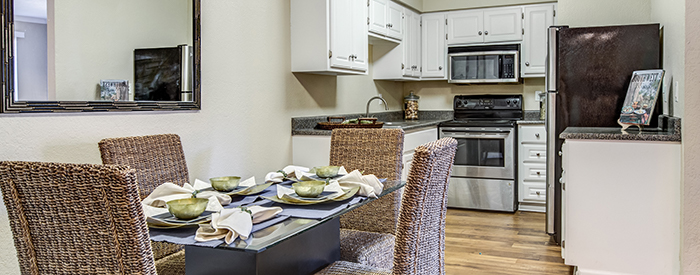 View of upgraded kitchen from the dining room at Aventerra at Dobson Ranch