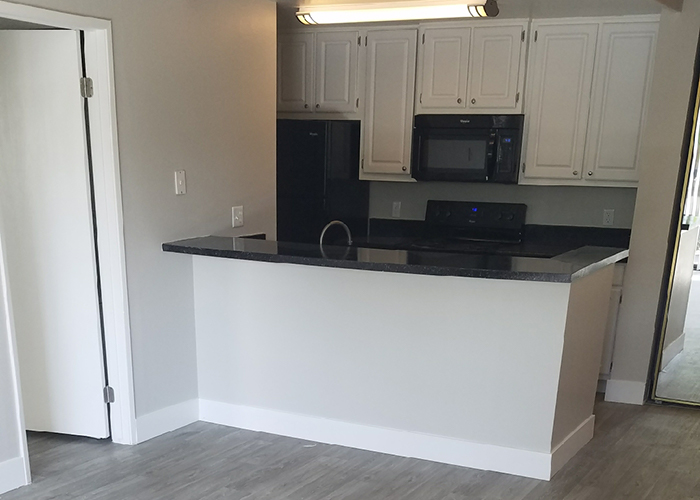 Redesigned kitchen and hardwood floors at Presidio at Rancho Del Oro