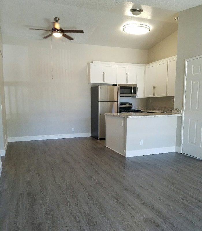 Upgraded kitchen and dining area in Redlands Lawn and Tennis Club apartment