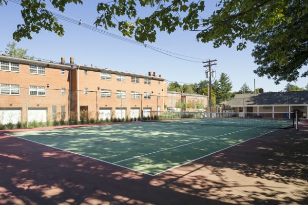 The tennis court at Chatham Hill is a perfect place to practice your backhand.