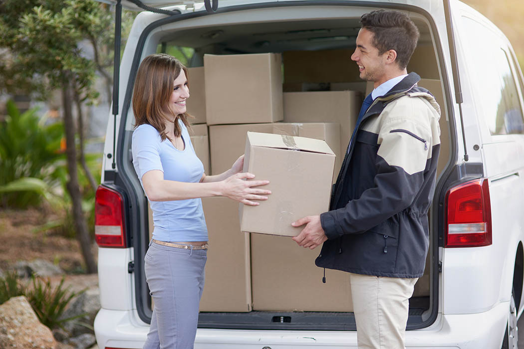 Man helping a woman move at Stor It Self Storage in Porterville