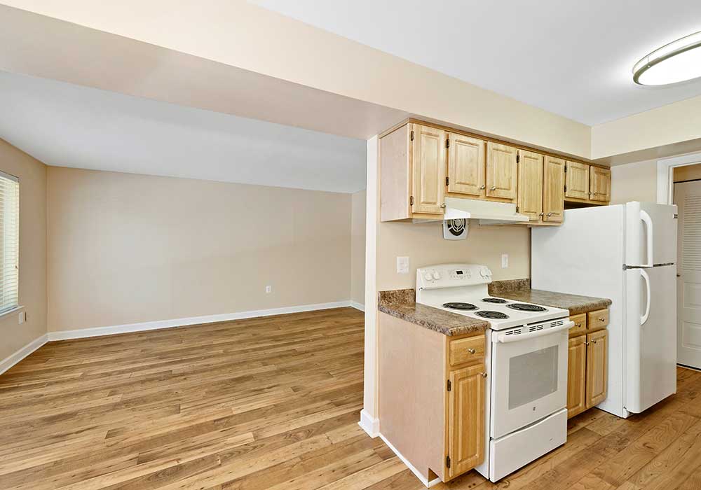 Kitchen and living room at EastView Communities have hardwood floors