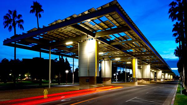 Power parasol with blurred car lights at night