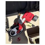 Red and Gray Plastic Tricycle