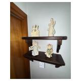 Delicate angel, figurines, and shelving