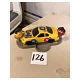M&M Candy dispenser under the hood car