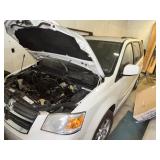 White Dodge Grand Caravan