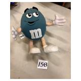 Blue M&M plush figure