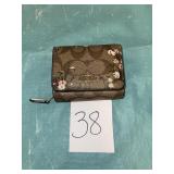 Coach Floral Embossed Leather Wallet