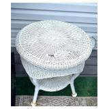SMALL RESIN WICKER ROUND TABLE - SHOWS WEAR
