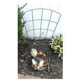GARDEN TRELLIS AND BOY  AND DOG STATUE