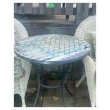 TILE TOP TABLE WITH TABLE CLOTH SHOWS WEAR