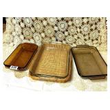 VINTAGE GLASS BAKINF DISHES, 1 WITH BASKET HOLDER