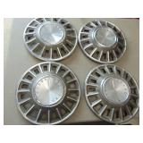 Four 1968 Mustang Hubcaps