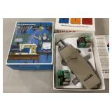 Singer Sewing Machine Buttonholer and Accessories