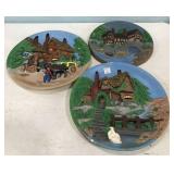 Three Ceramic Hand Painted 3-D Wall Plates