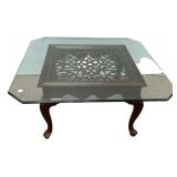 17"h., 38"w Glass Top Coffee Table