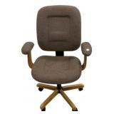Mid century style office chair featuring brown twe